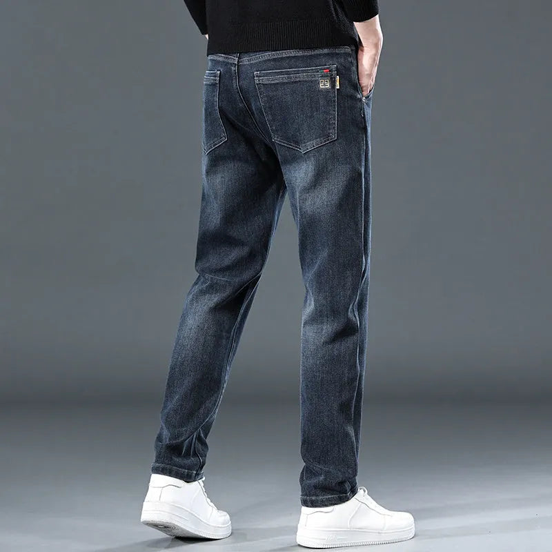 Men's slim straight casual trousers in thin polyester fabric shown in black and blue-grey colour options