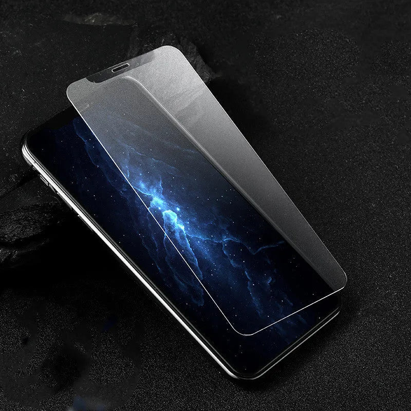 Tempered glass screen protector for Apple iPhone models on a clean surface.