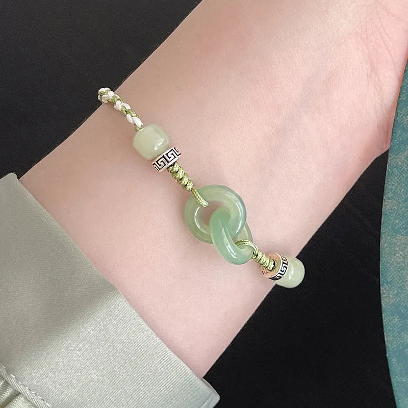 Green copper ethnic bracelet with a peace buckle and jade double rings, animal Zodiac modelling.