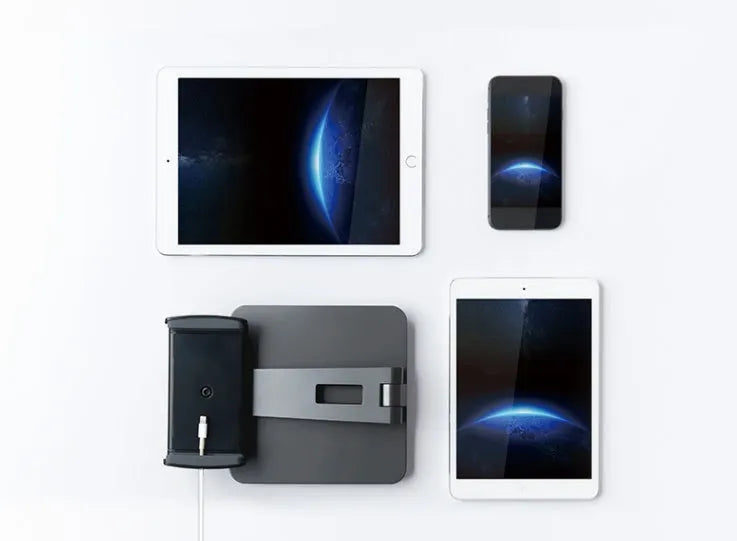 Folding aluminium phone and tablet stand with black silicone pads, shown holding a tablet at an angle.