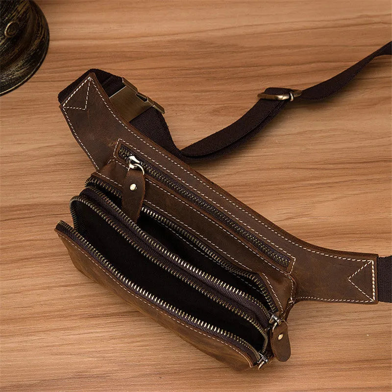 Brown cowhide leather men's sports waist bag with zip and internal phone pocket.