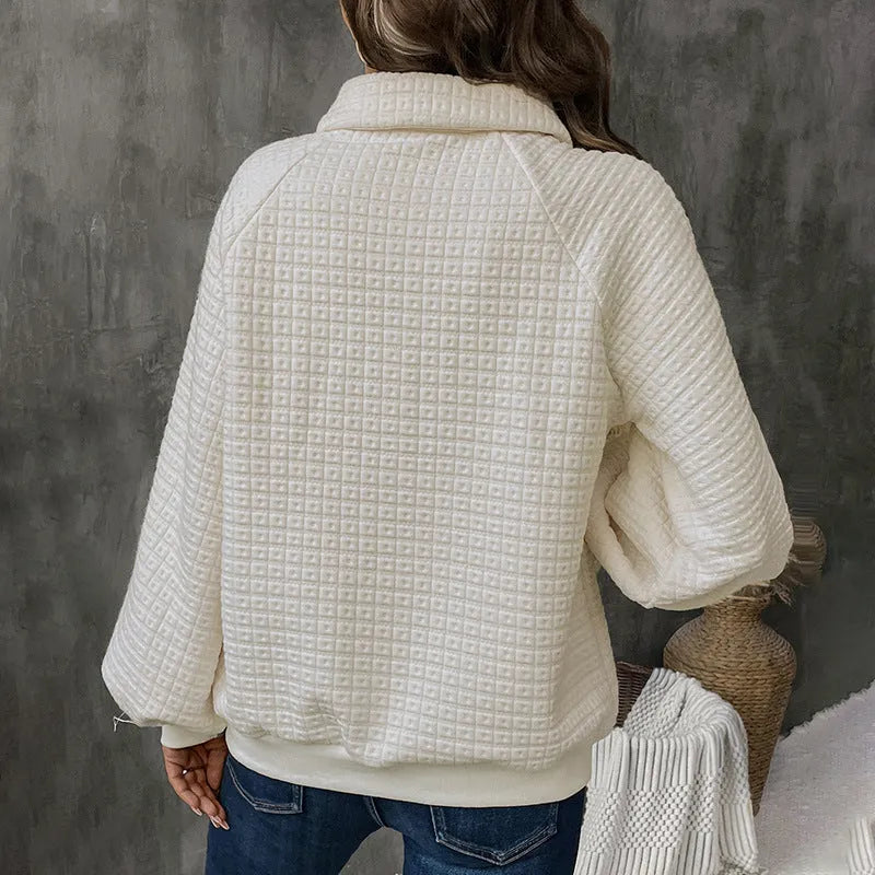 Women's milky white polo collar thickened pullover sweater on a hanger.