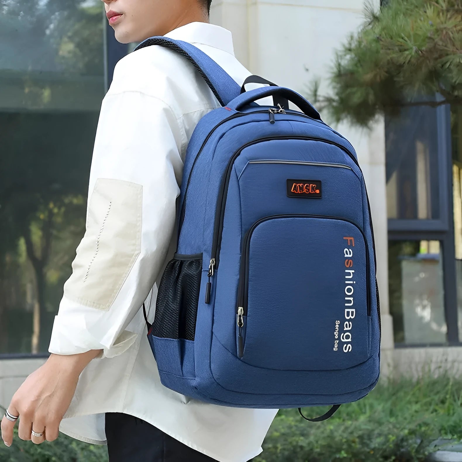 Nylon fashion backpack in black showing double shoulder straps and multiple zippered compartments.