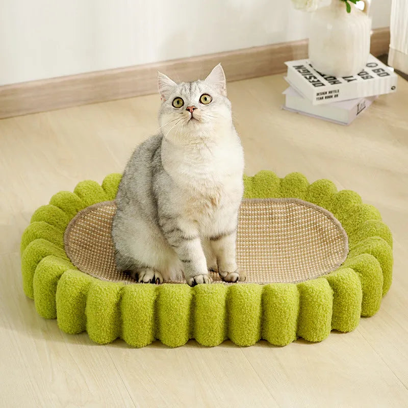 Green oval cat scratch pad bowl bed made from sisal measuring 650mm by 420mm
