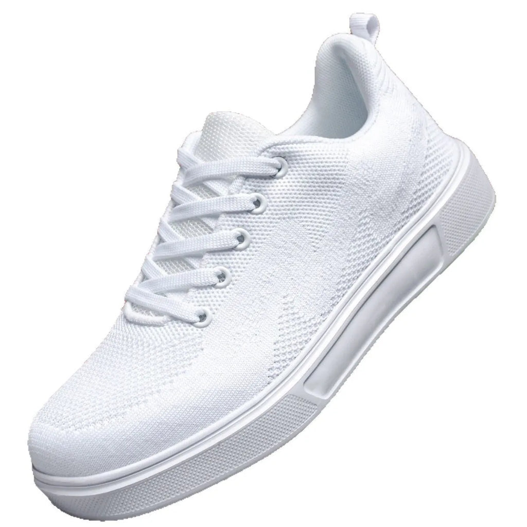 Light white thick sole casual sports shoes with mesh upper and lace-up front.