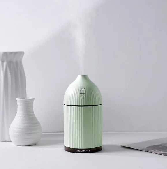 White 300ml USB aromatherapy diffuser with LED light on desk