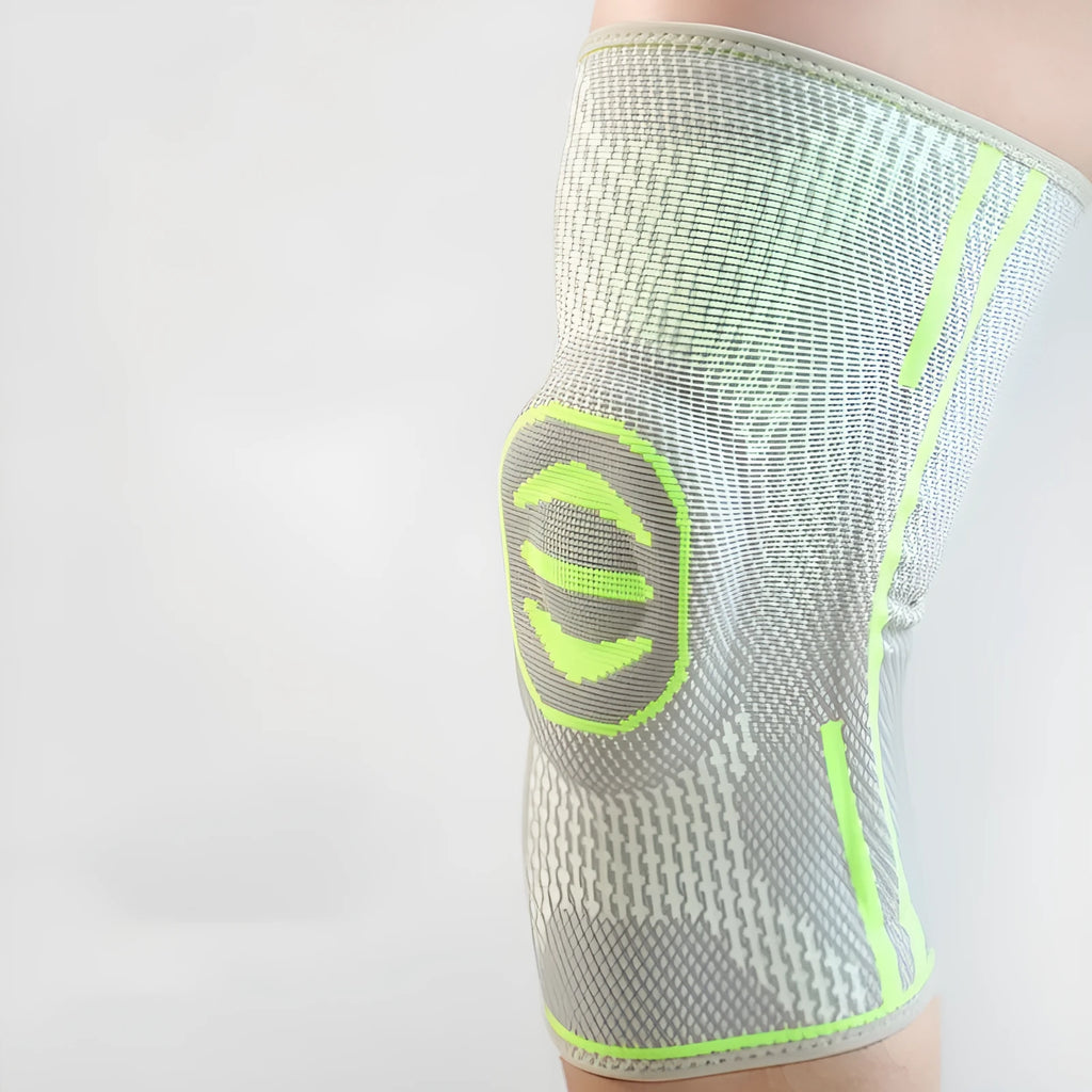 A green cotton knee pad for mountaineering and sports protection, shown in size M.