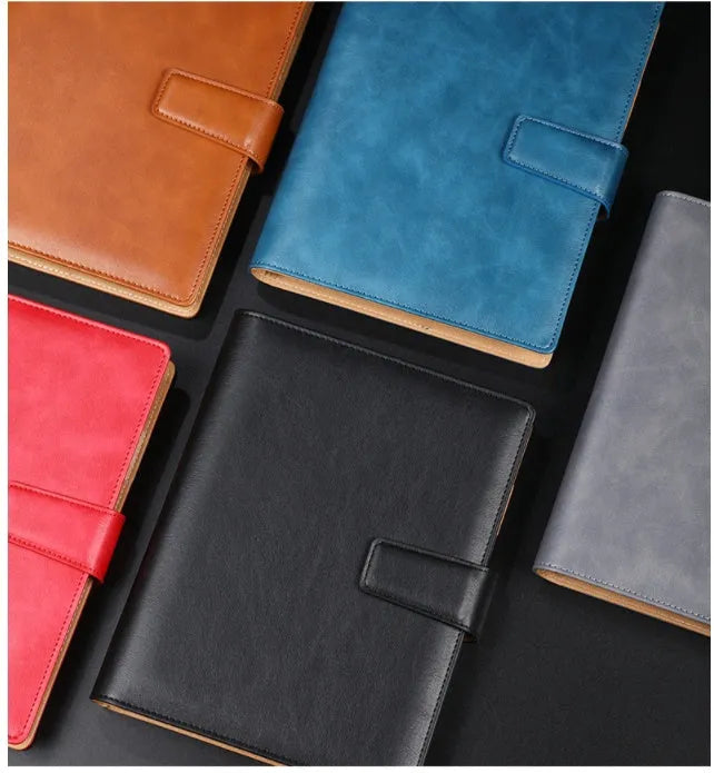 A5 hardcover PU binder notebook with metal buckle clip, shown in multiple colours.