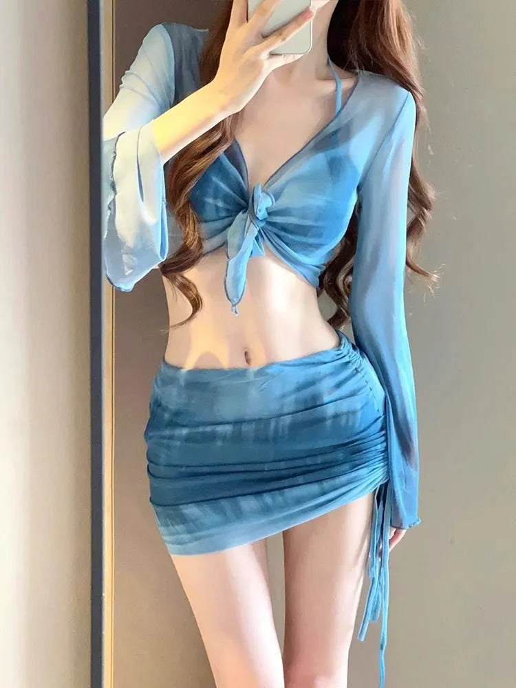 Women's blue high-waist bikini four-piece swimsuit set with shirt, bra, underwear and skirt