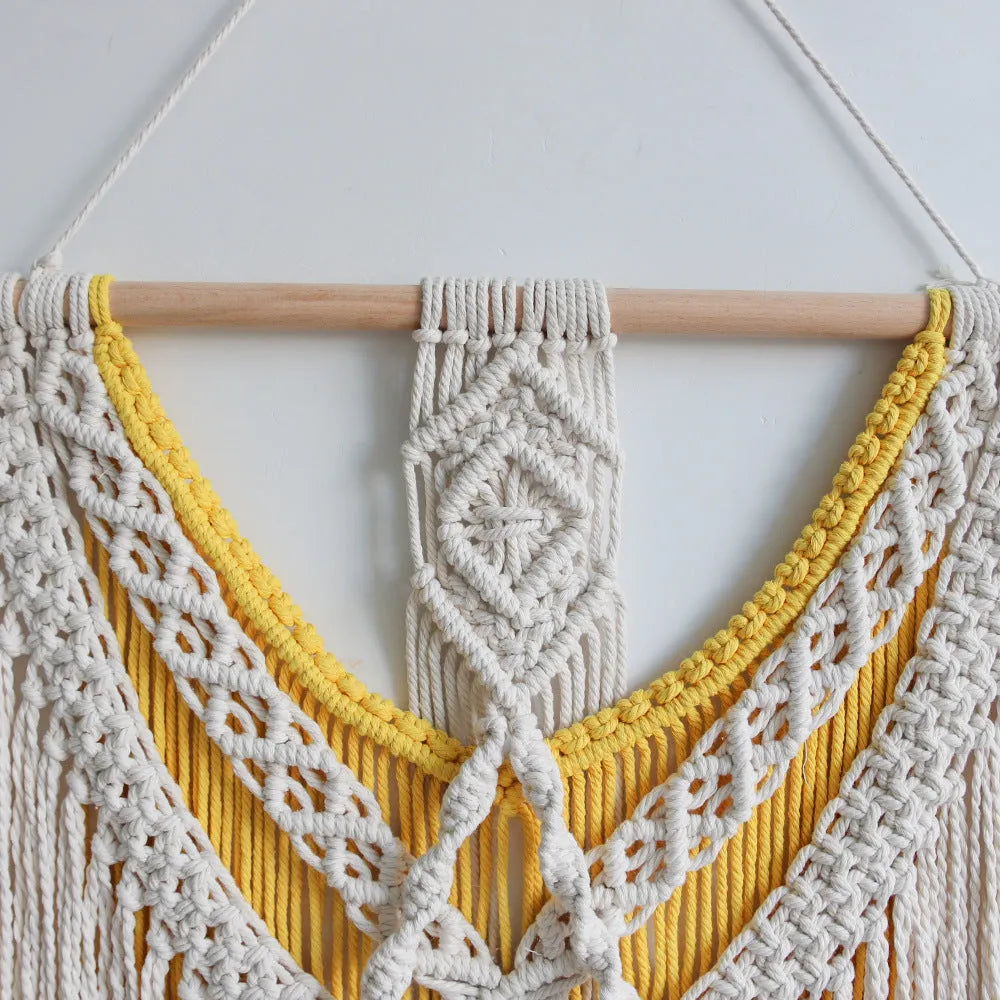 Nordic style creamy white cotton wall tapestry with hand-woven texture measuring 120 by 95 cm
