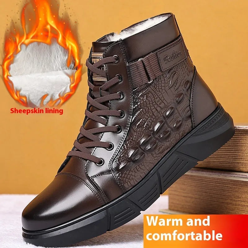 Black genuine leather snow boots with a fur collar, rubber sole, and front laces on a winter background.