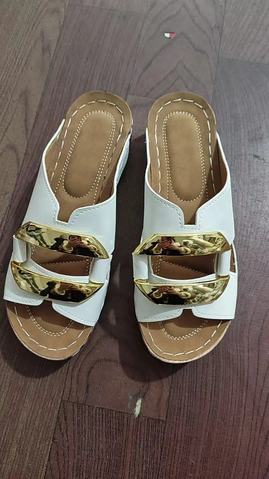 Women's Roman style platform sandals in black, white, khaki, and sea blue on a rubber sole.