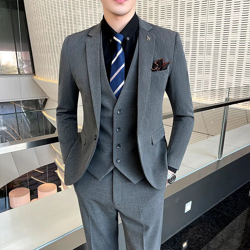 Men's slim fit suit in black and dark grey, cotton blend fabric, business formal wear set.