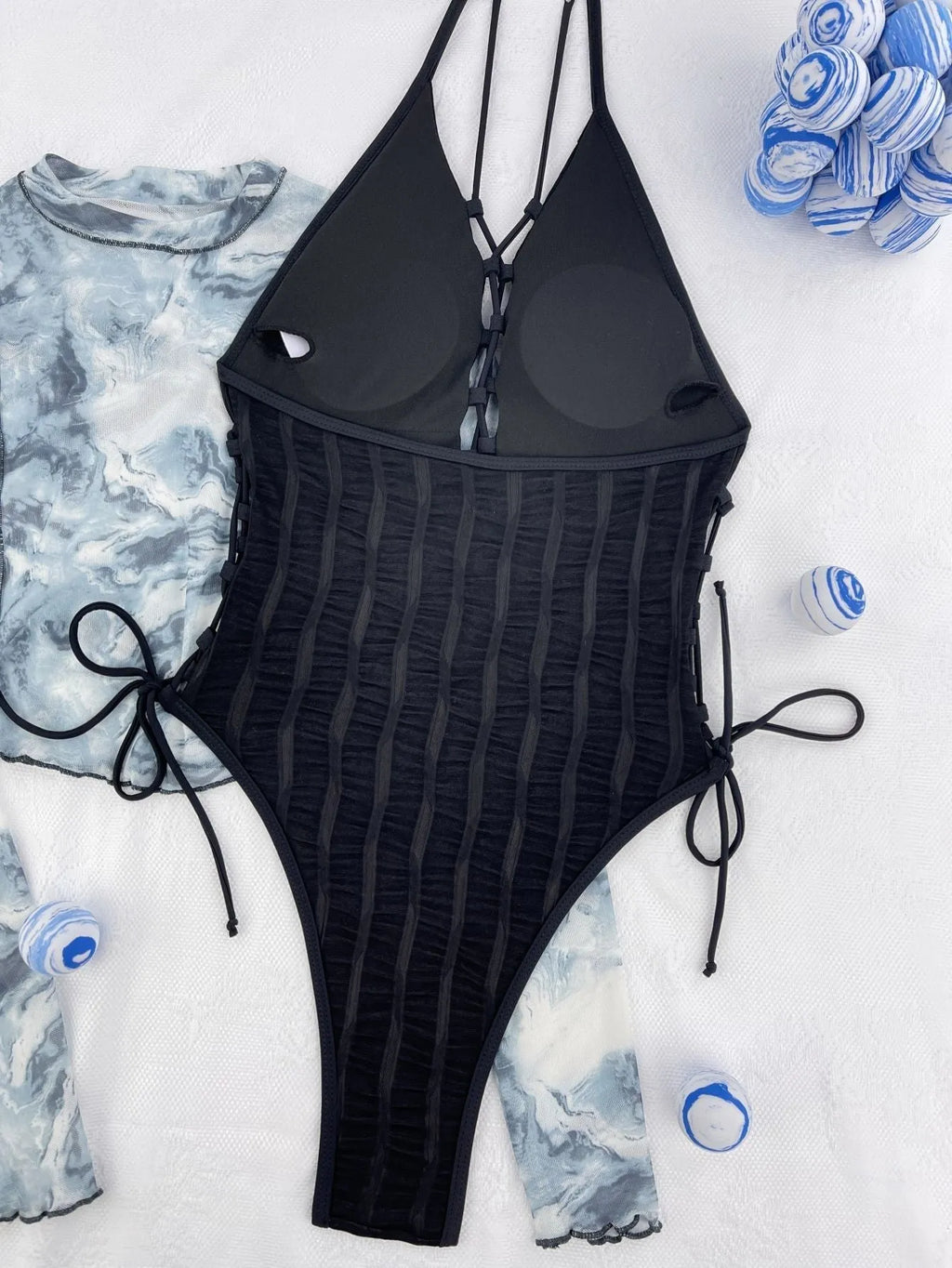 Black solid colour one-piece swimsuit for women in polyester fabric