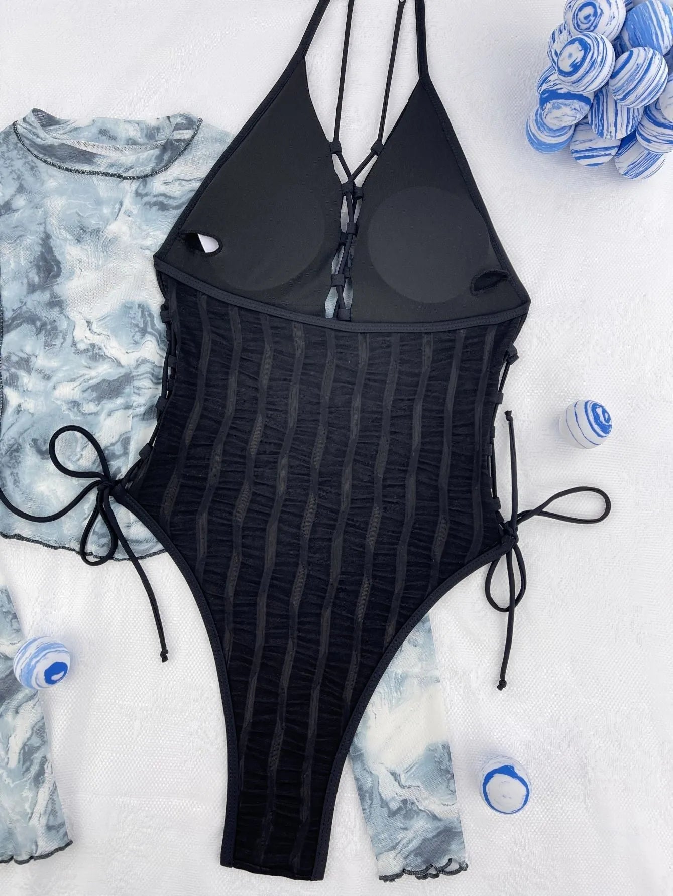Black solid colour one-piece swimsuit for women in polyester fabric