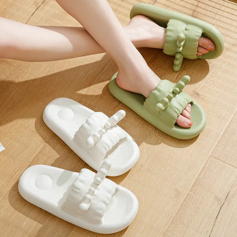 Women's Deer Horn design flip flop slippers in light yellow with hollow-out EVA upper and textured sole.