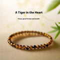 Tiger's Eye stone bracelet with geometric design in New Chinese style showing different bead sizes