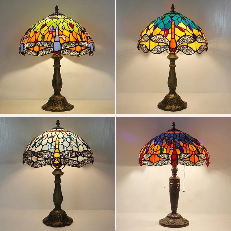 Stone Tiffany dragonfly table lamp in European retro style on a wooden table.