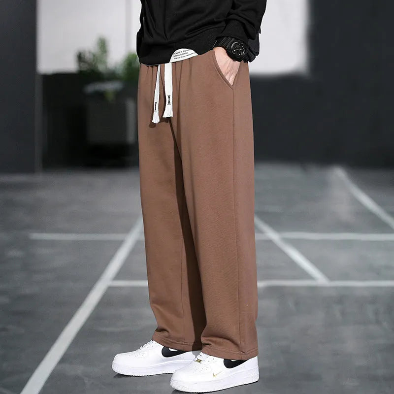 Men's casual bamboo fibre high-waist sports trousers in grey, shown with multiple pockets