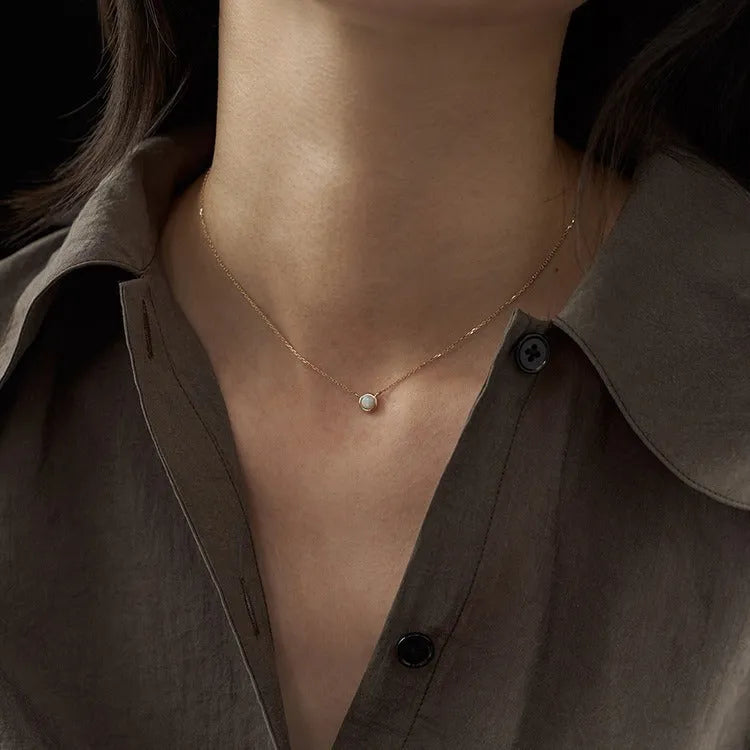 Oval geometric jelly opal pendant on a chain with 14K gold or white gold plating over S925 silver.