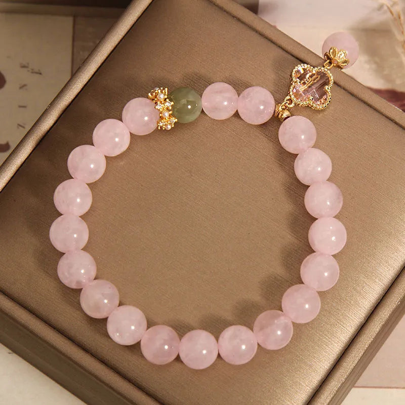 Pink crystal women's bracelet with four-leaf clover pendant and alloy gemstone inlay