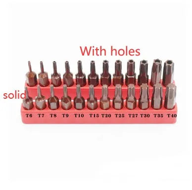 Black steel screwdriver bits T6 to T40 with hollow and solid hex heads on a magnetic strip.