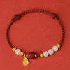 Women's adjustable Hetian jade and cinnabar red rope bracelet with 925 silver clasp