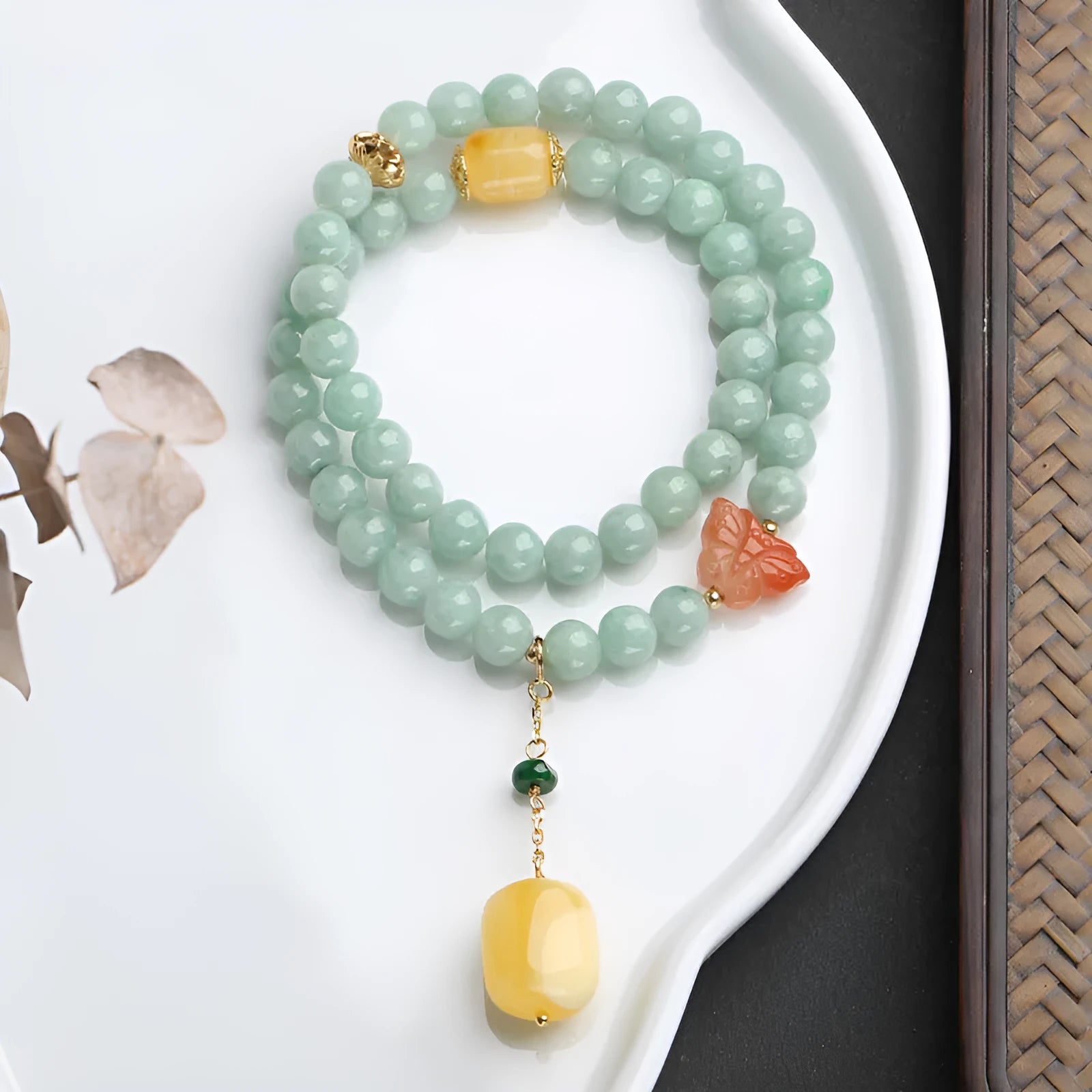 Double-layer women's bracelet with jade round beads and hanging beeswax barrel beads in retro geometry design