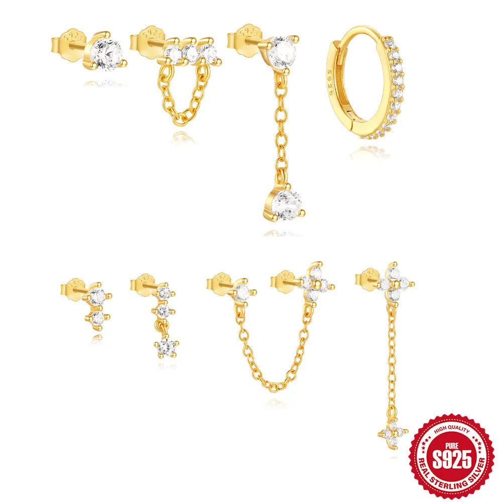 A pair of S925 sterling silver earrings with a geometric clover petal design and an electroplated gold finish.