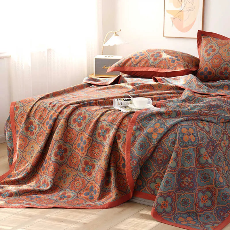 Three-piece cotton gauze bedding set with floral pattern blanket and matching pillowcases