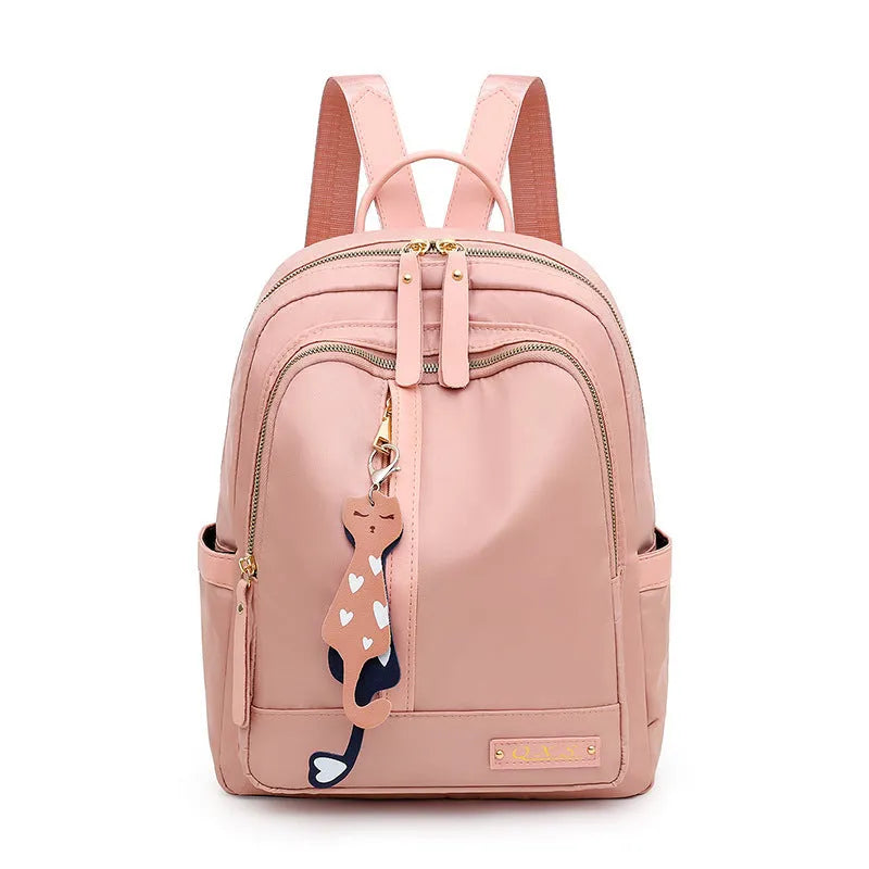 Men's black casual nylon backpack with shoulder straps, showing outer pocket and square vertical shape.