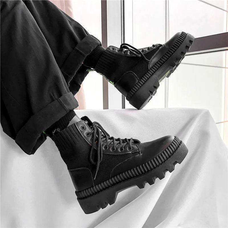 Men's black frosted leather Dr. Martens platform ankle boots with a side zip fastening.