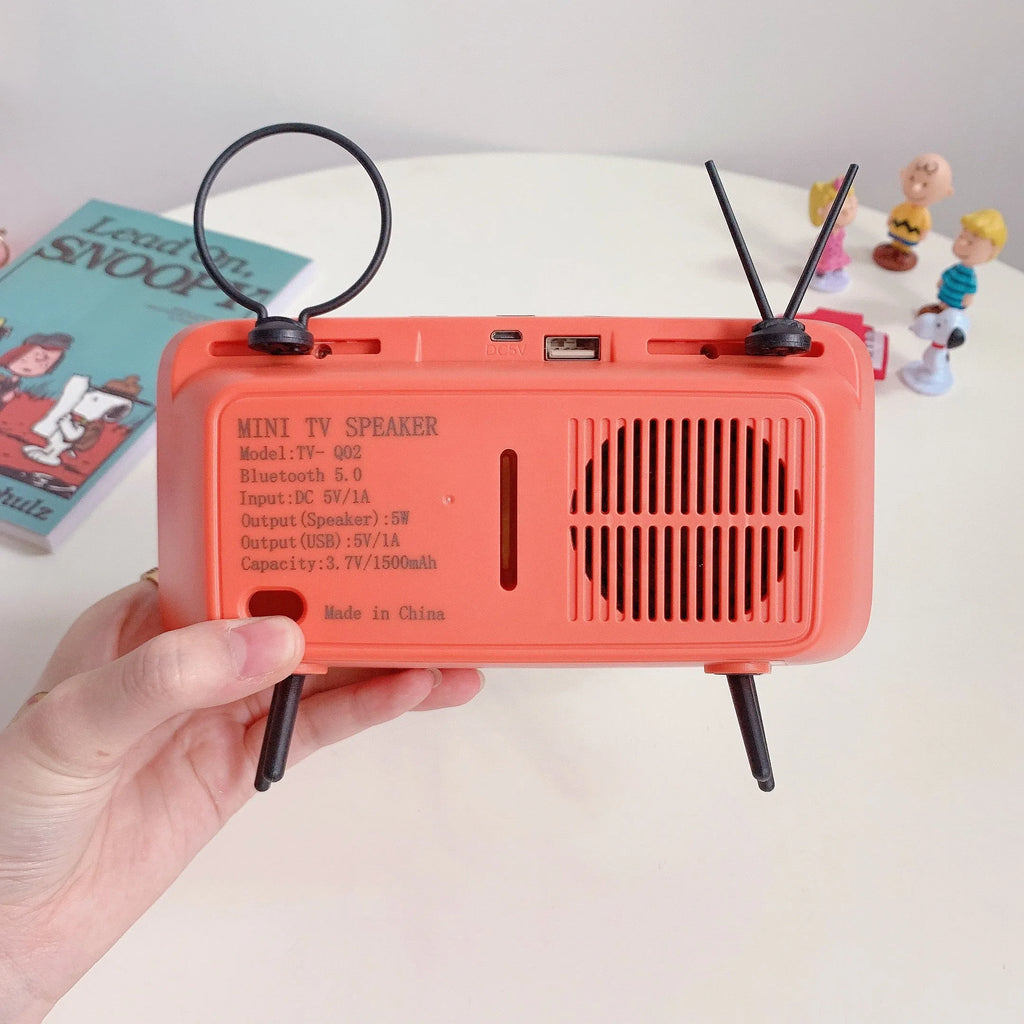 Vintage wooden TV Retro phone stand with built-in speaker, Bluetooth connectivity, and phone placed on top