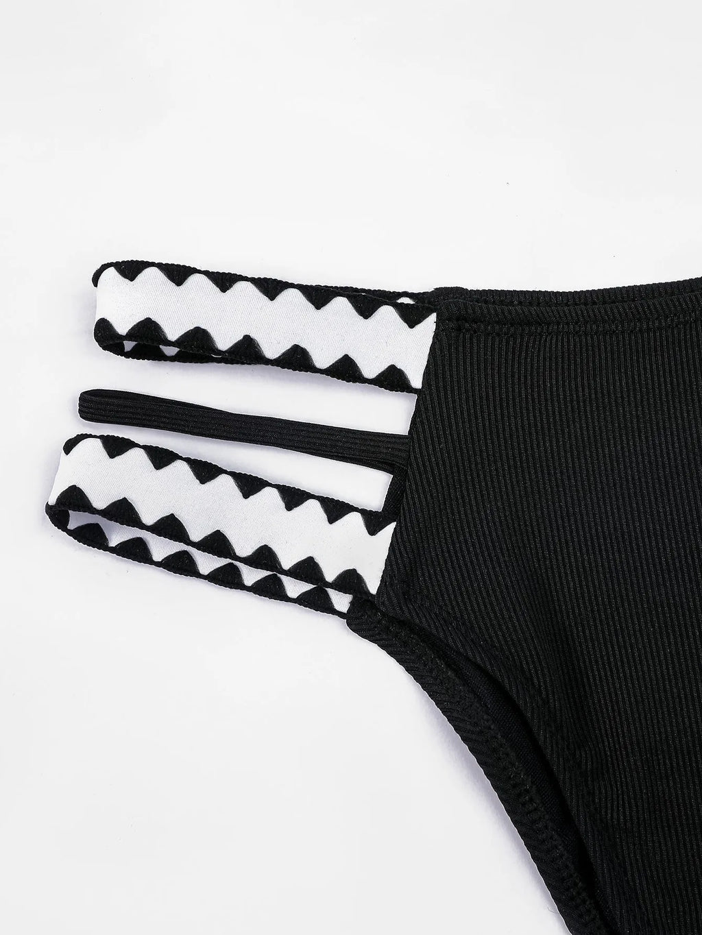 Black women's bikini swimsuit with a hollowed-out split design, showing front and back views.