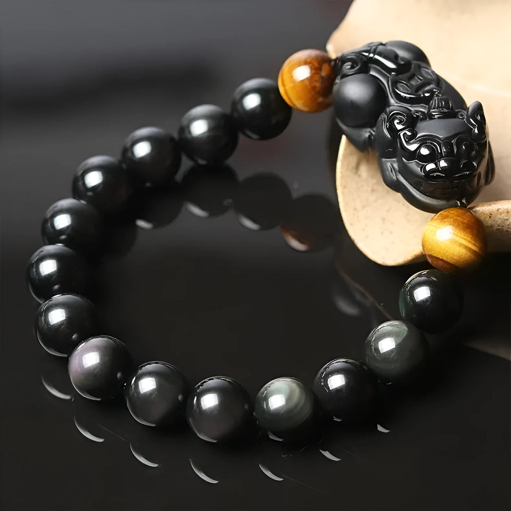 Mexico gold sheen obsidian crystal Pi Xiu bracelet with black adjustable cord, showing bead detail