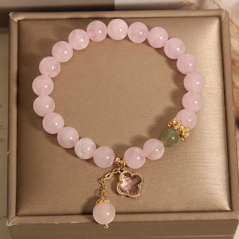 Pink crystal women's bracelet with four-leaf clover pendant and alloy gemstone inlay