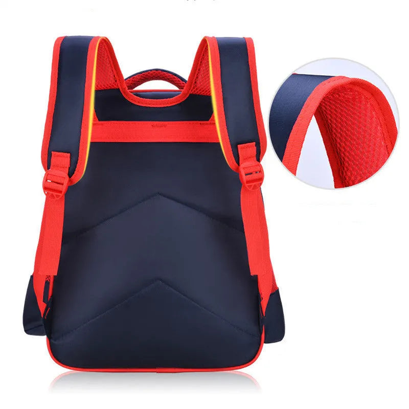 Blue children's cartoon backpack with load-reducing straps and a pencil case attached.