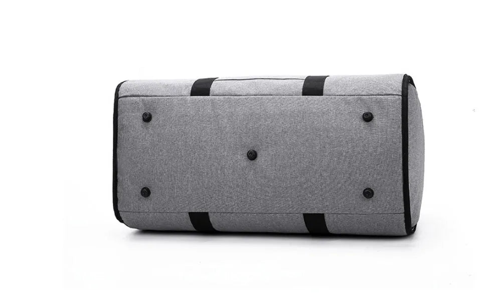 Medium cylinder-shaped travel bag in Oxford cloth, shown in black, with a zipper opening and internal pocket.