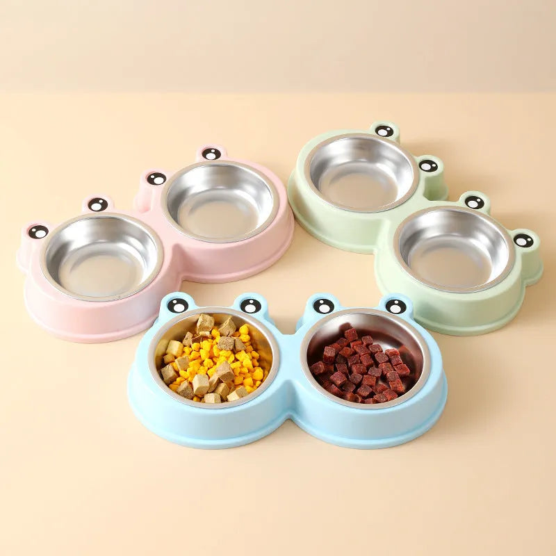 Stainless steel pet double bowl with frog design for cat and dog food and water.