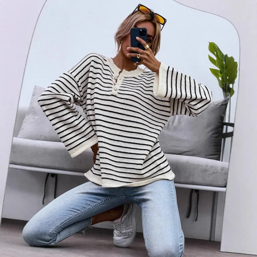 Black women's striped casual top with drop-shoulder sleeves and button details