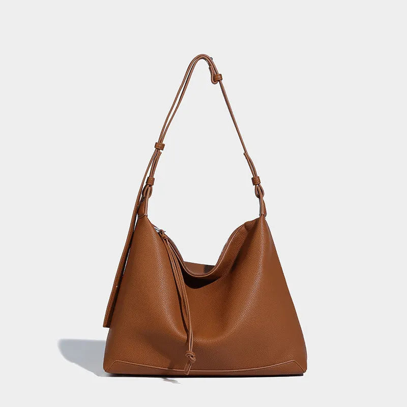 Large soft PU messenger bag in caramel colour showing 36cm length and shoulder strap
