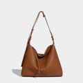 Large soft PU messenger bag in caramel colour showing 36cm length and shoulder strap