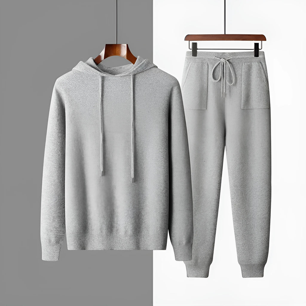 Men's light grey hooded knitted sweatshirt and matching long trousers casual set.