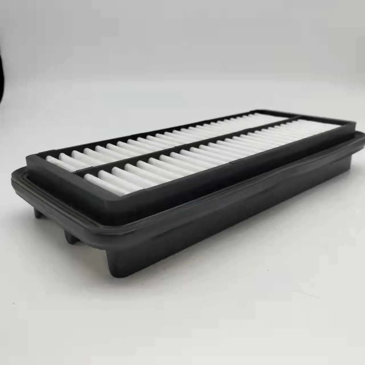 Black panel car air filter with dimensions 256mm by 113mm by 40mm for Modern vehicles.