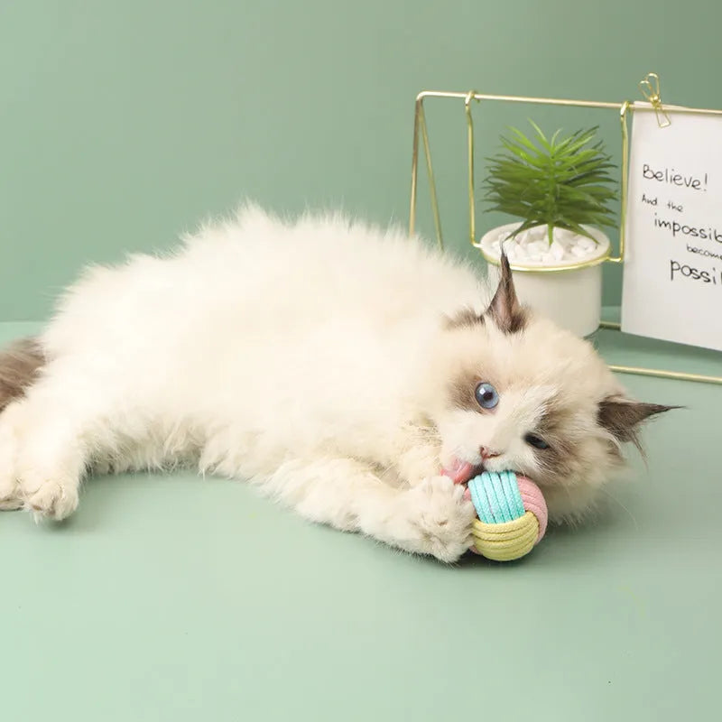 Handmade soft cotton plush ball cat toy in blue powder, green blue, or pink green colours, 5cm diameter