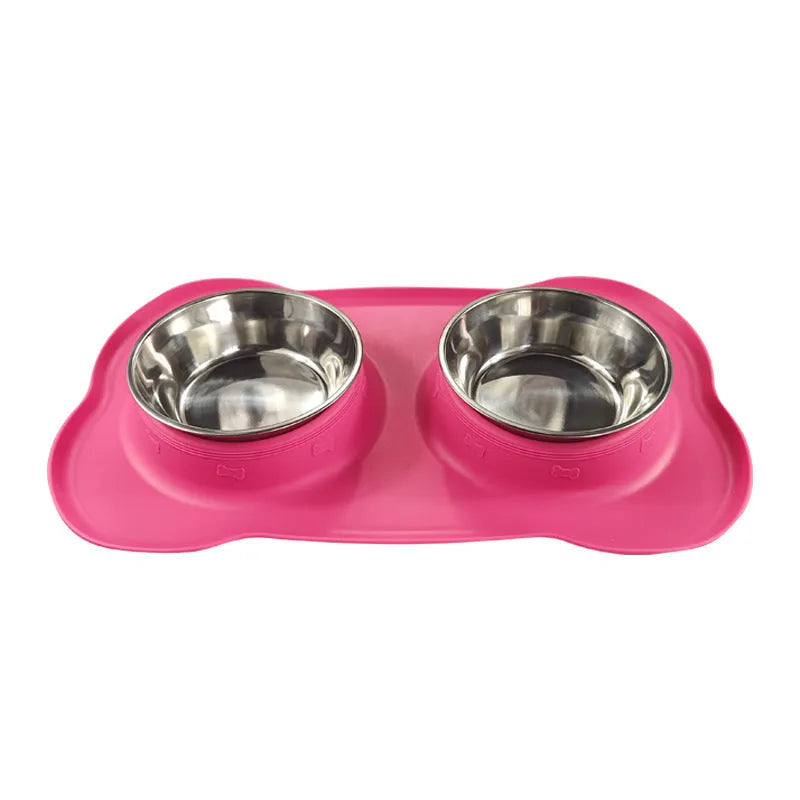 Large silicone pet feeding mat with two bowl slots in blue colour on hard floor
