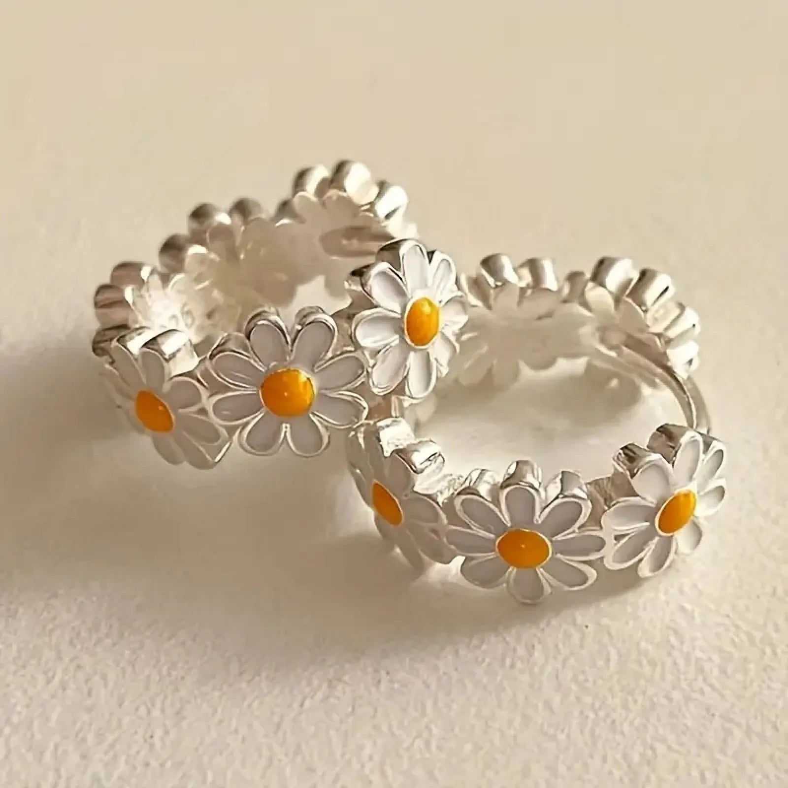 White daisy flower ring earrings with electroplated platinum finish and copper construction