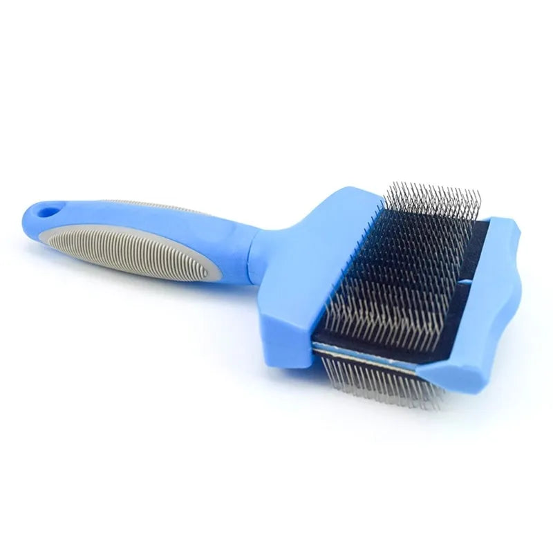 Blue and pink double-sided pet brush with stainless steel pins and ergonomic handle.
