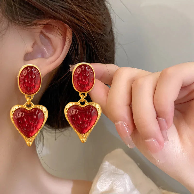 Oval love heart stud earrings with silver needle pleating in four colour options