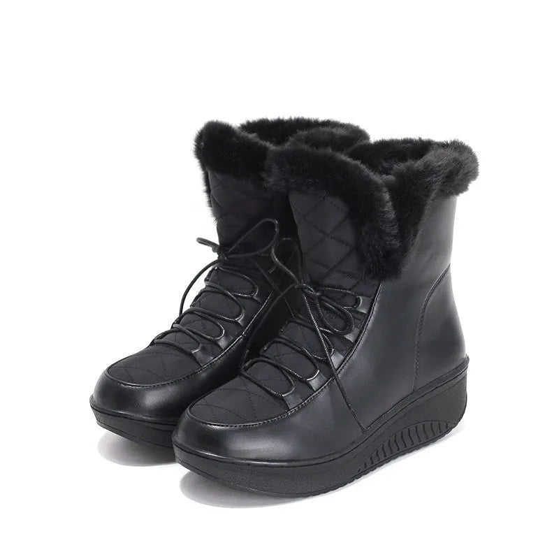 Black women's winter boots with lace-up front, 3cm platform sole, and plush lining.